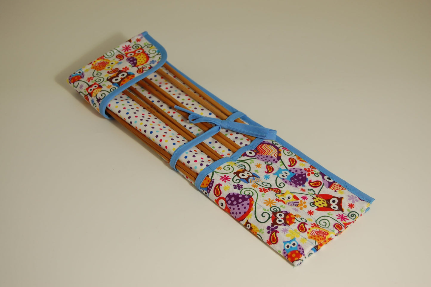 Knitting pins - 8 prs bamboo knitting needles in fabric case showing cartoon owls