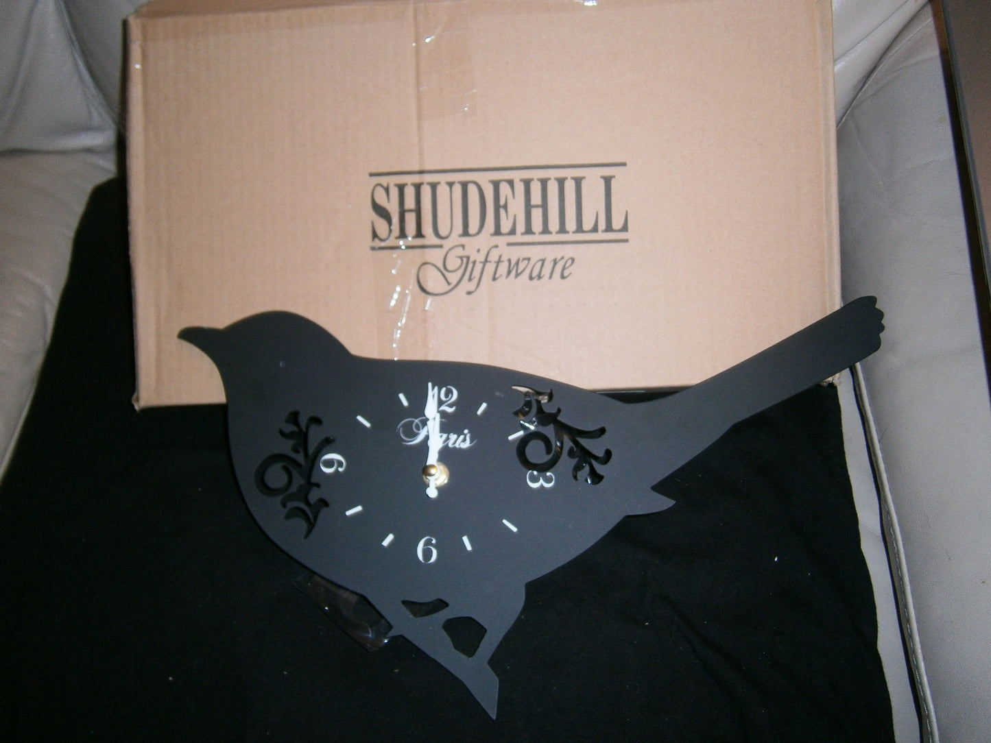 silhouette bird clock