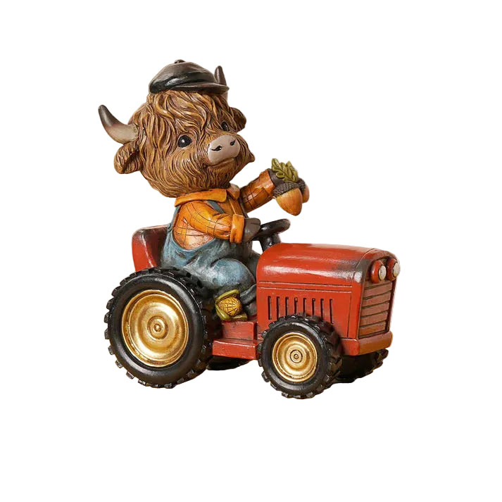 Country Living Highland Cow on Tractor