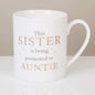 English porcelain mug with inscription "This Sister is being promoted to Auntie"