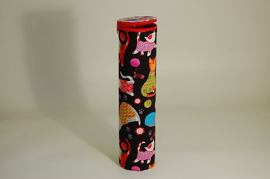 Knitting Pin holder - cylinder shape tube - fabric shows cartoon cats design on a dark background - hanrattycraftsgifts.co.uk